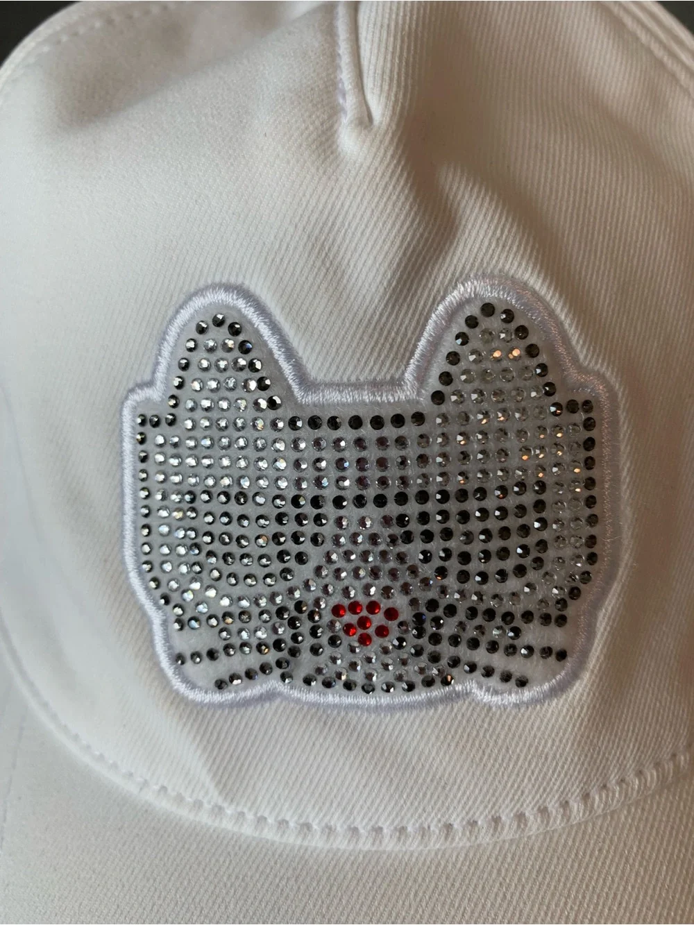 Karl Lagerfeld White Cap with Crystal Cat Motif